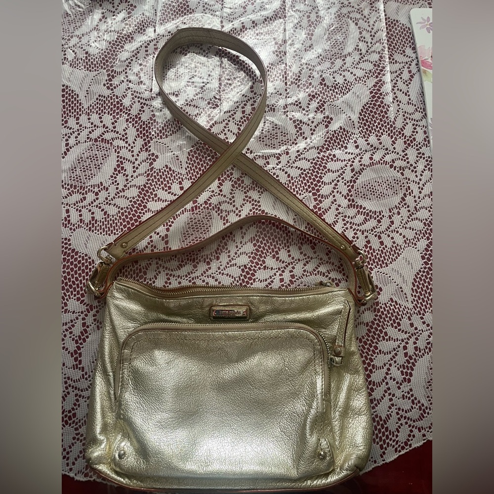 Kate spade bag 
Color : Gold 
Condition : Used but still good